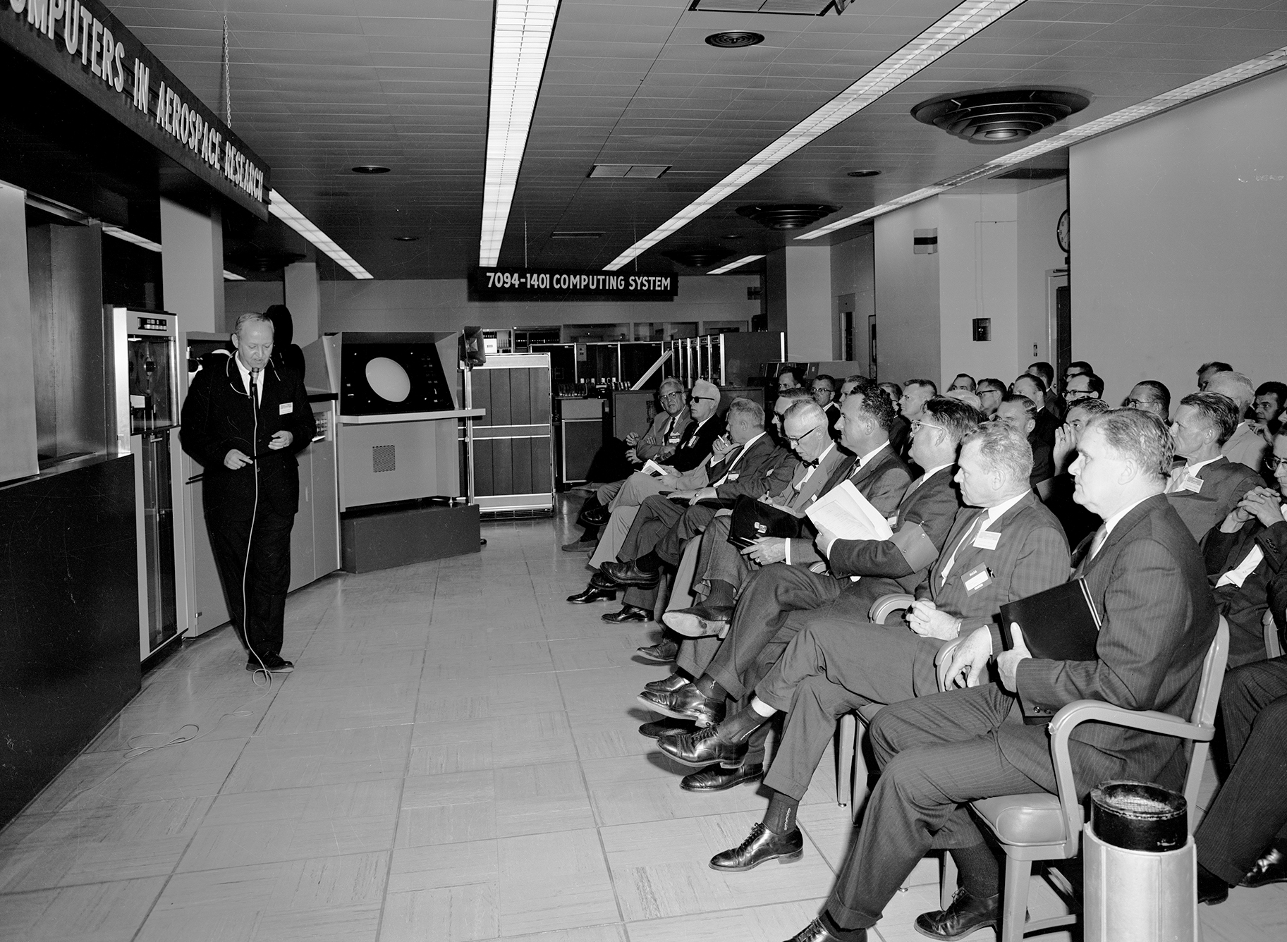 People seated viewing speaker.