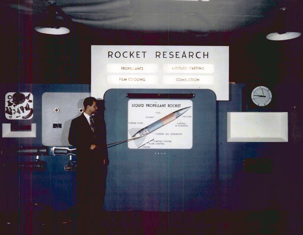 Man pointing to display