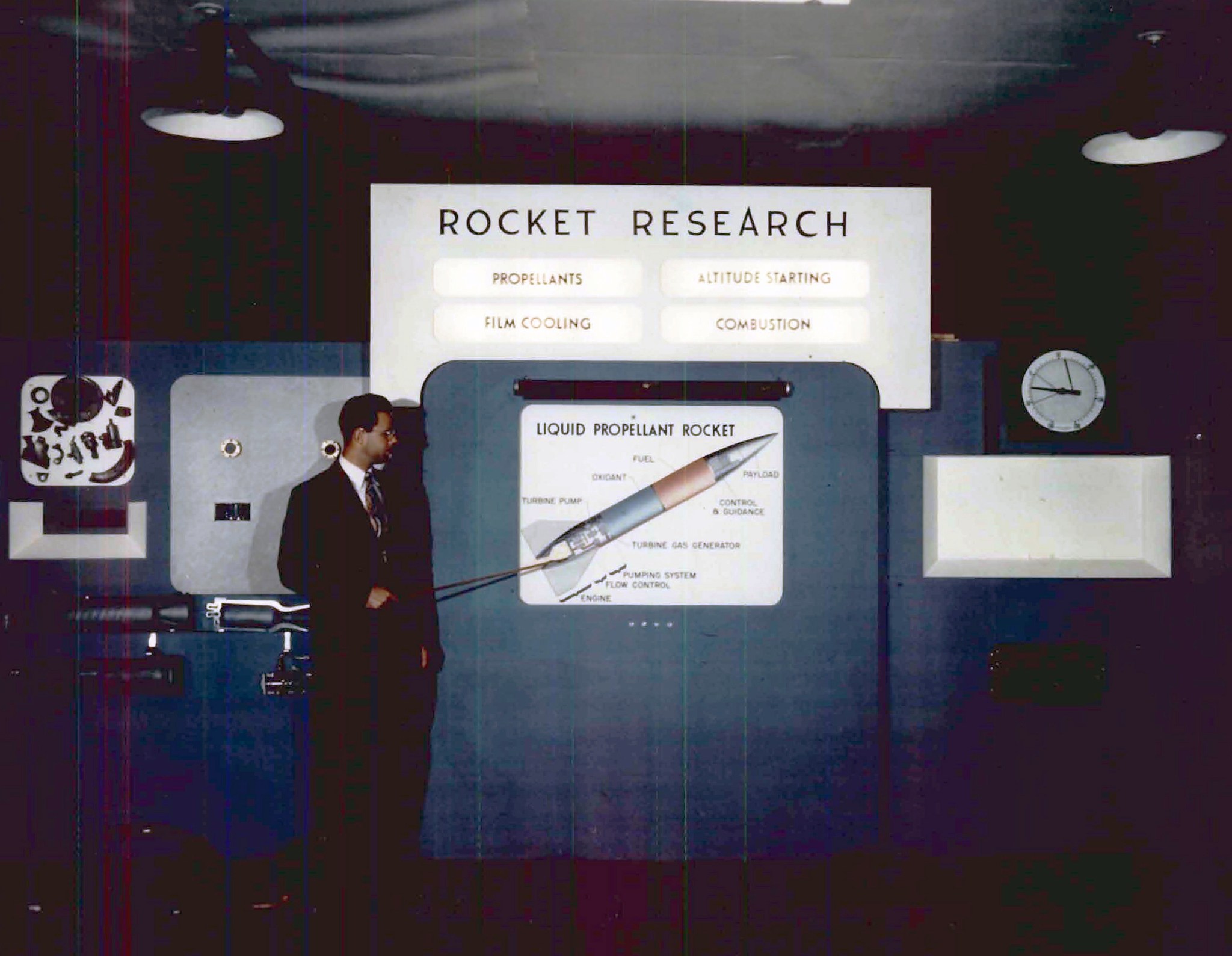 Man pointing to display