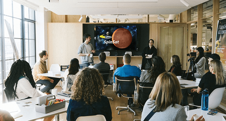 group of people at a small workshop