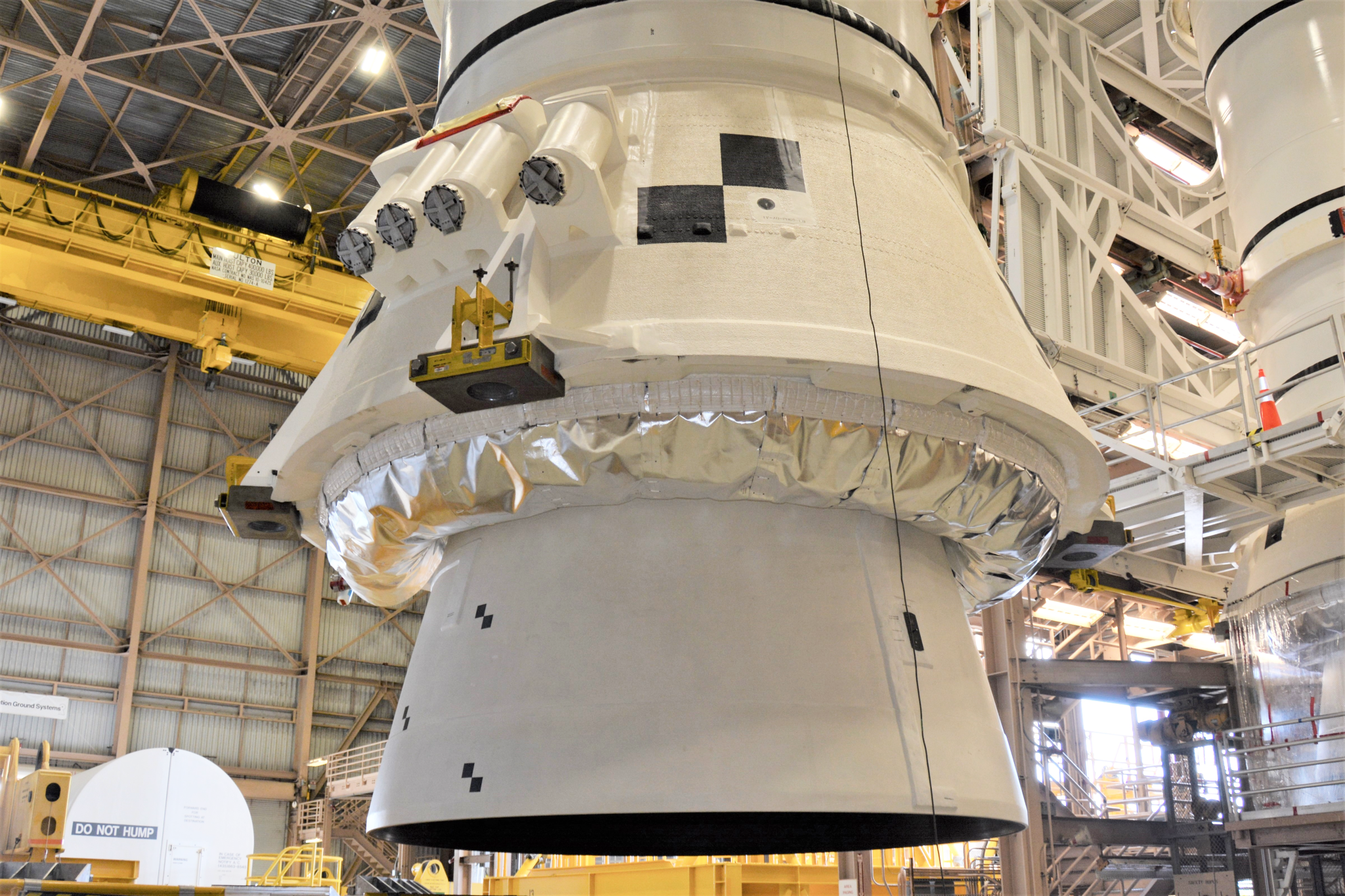 Artemis I booster aft assembly stacked on the mobile launcher in the Vehicle Assembly Building at Kennedy.