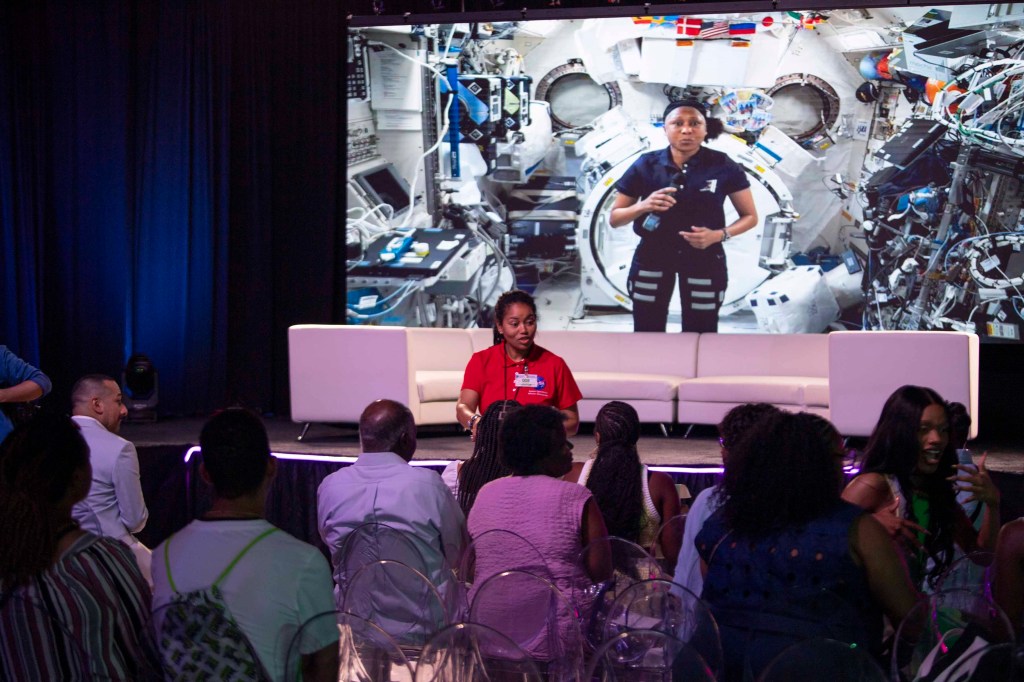 NASA program specialist Miyoshi Collins talks with an annual ESSENCE Fest audience