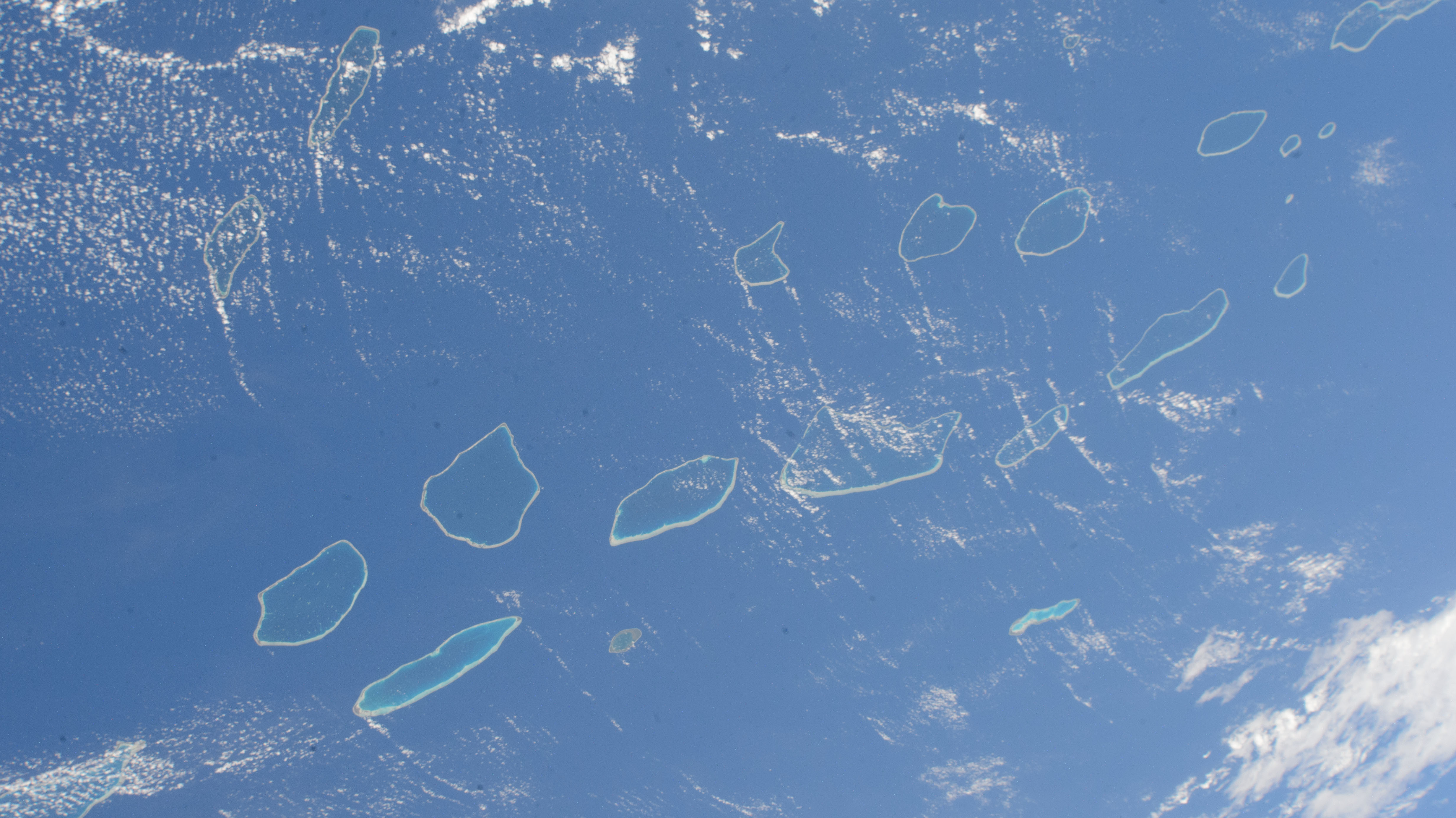 The Palliser Islands, atolls that are part of Fench Polynesia's Tuamotu Archipelago in the Pacific Ocean, are pictured from the International Space Station as it orbited 266 miles above.