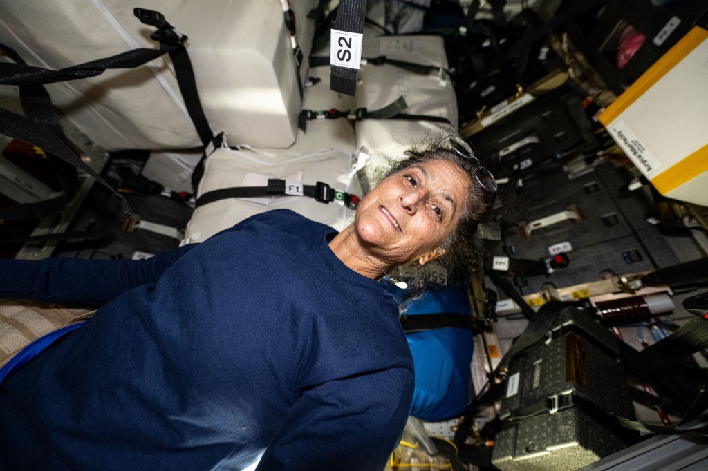 NASA astronaut and Boeing Starliner Pilot Suni Williams is pictured inside the Northrop Grumman Cygnus space freighter during cargo operations.
