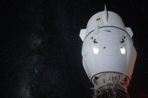 The Milky Way appears in the vastness of space behind the SpaceX Dragon Endeavour spacecraft docked to the Harmony module's space-facing port on the International Space Station.