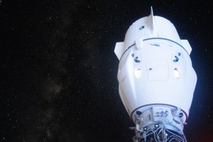 The Milky Way appears in the vastness of space behind the SpaceX Dragon Endeavour spacecraft docked to the Harmony module's space-facing port on the International Space Station.