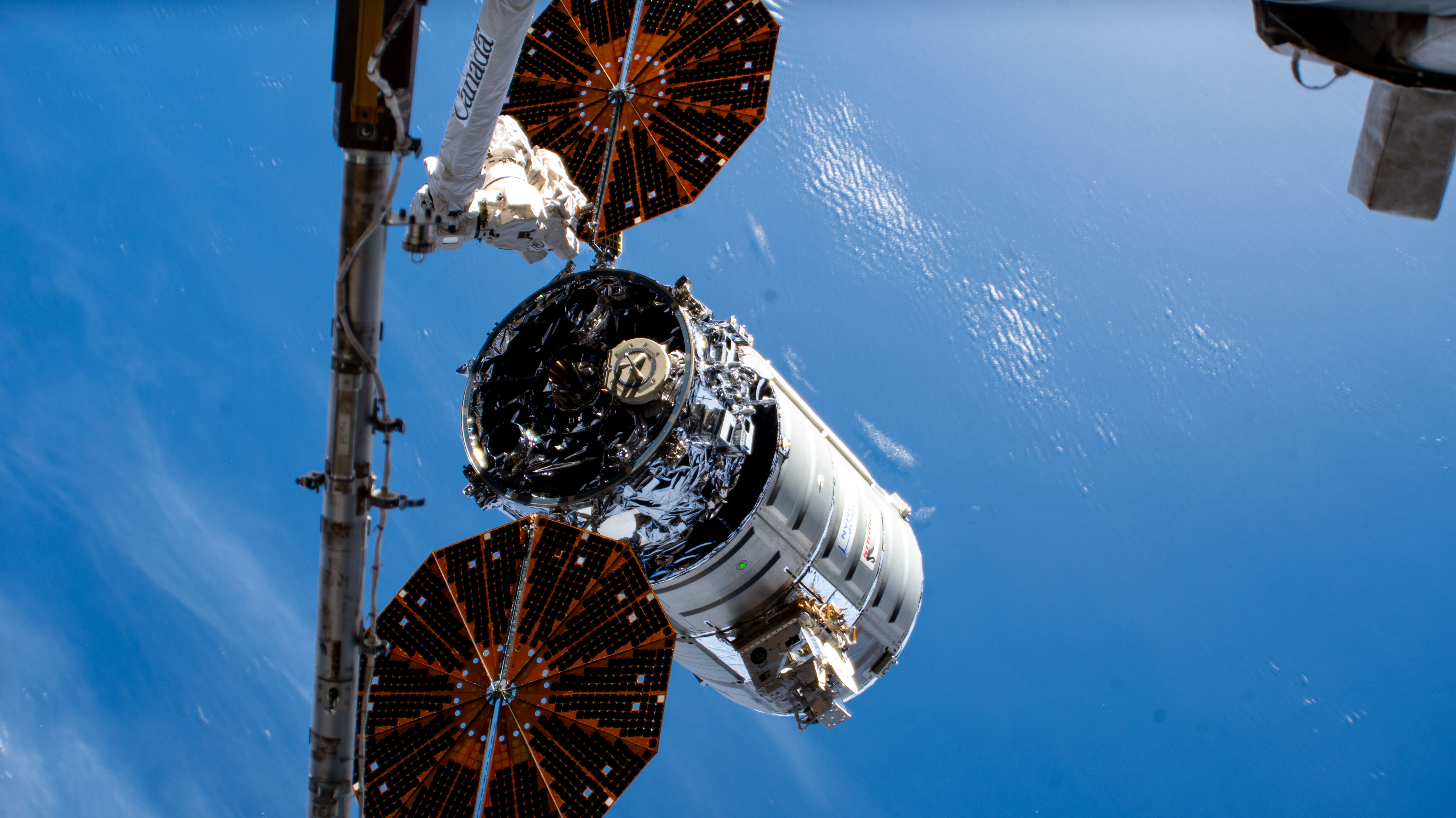 Northrop Grumman's Cygnus space freighter was released from the 57.7-foot-long Canadarm2 robotic arm into Earth orbit ending a five-and-a-half month cargo mission berthed to the International Space Station's Unity module.
