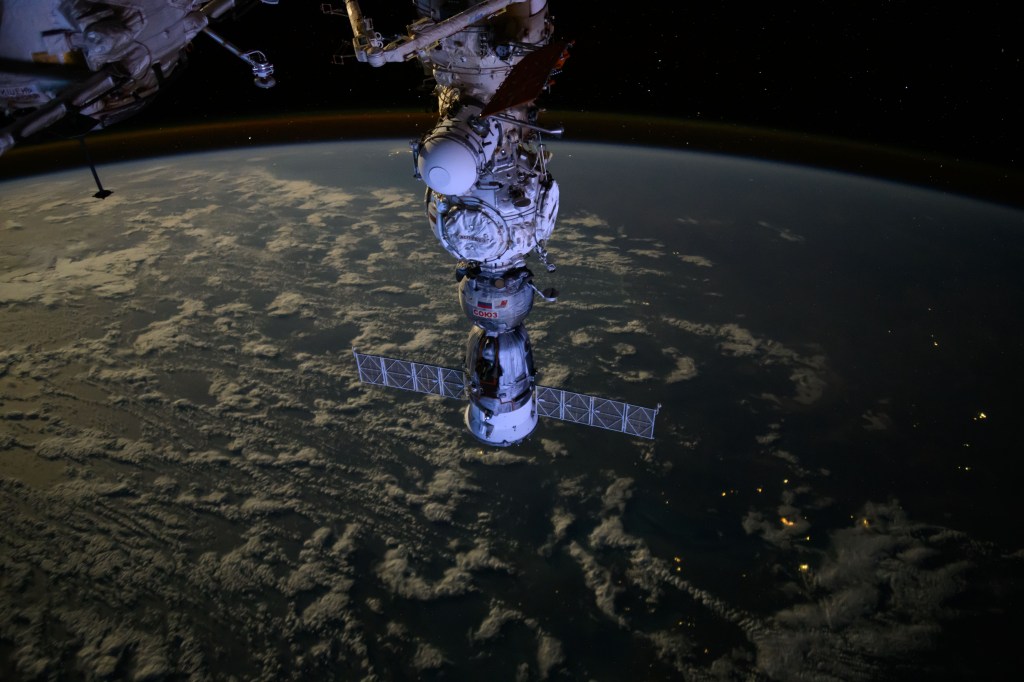 The Soyuz MS-25 crew ship is picture docked to the Prichal docking module as the International Space Station orbited 271 miles above the Bass Strait in between Australia's mainland province of Victoria and its island province of Tasmania.