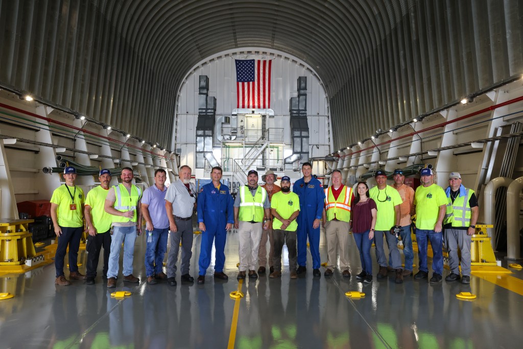 The Pegasus crew and team, from left, includes Kelton Hutchinson, Jeffery Whitehead, Jason Dickerson, Arlan Cochran, John Brunson, NASA astronaut Reid Wiseman, Marc Verhage, Terry Fitzgerald, Scott Ledet, CSA astronaut Jeremy Hansen, Wil Daly, Ashley Marlar, Farid Sayah, Jamie Crews, Joe Robinson, and Nick Owen.