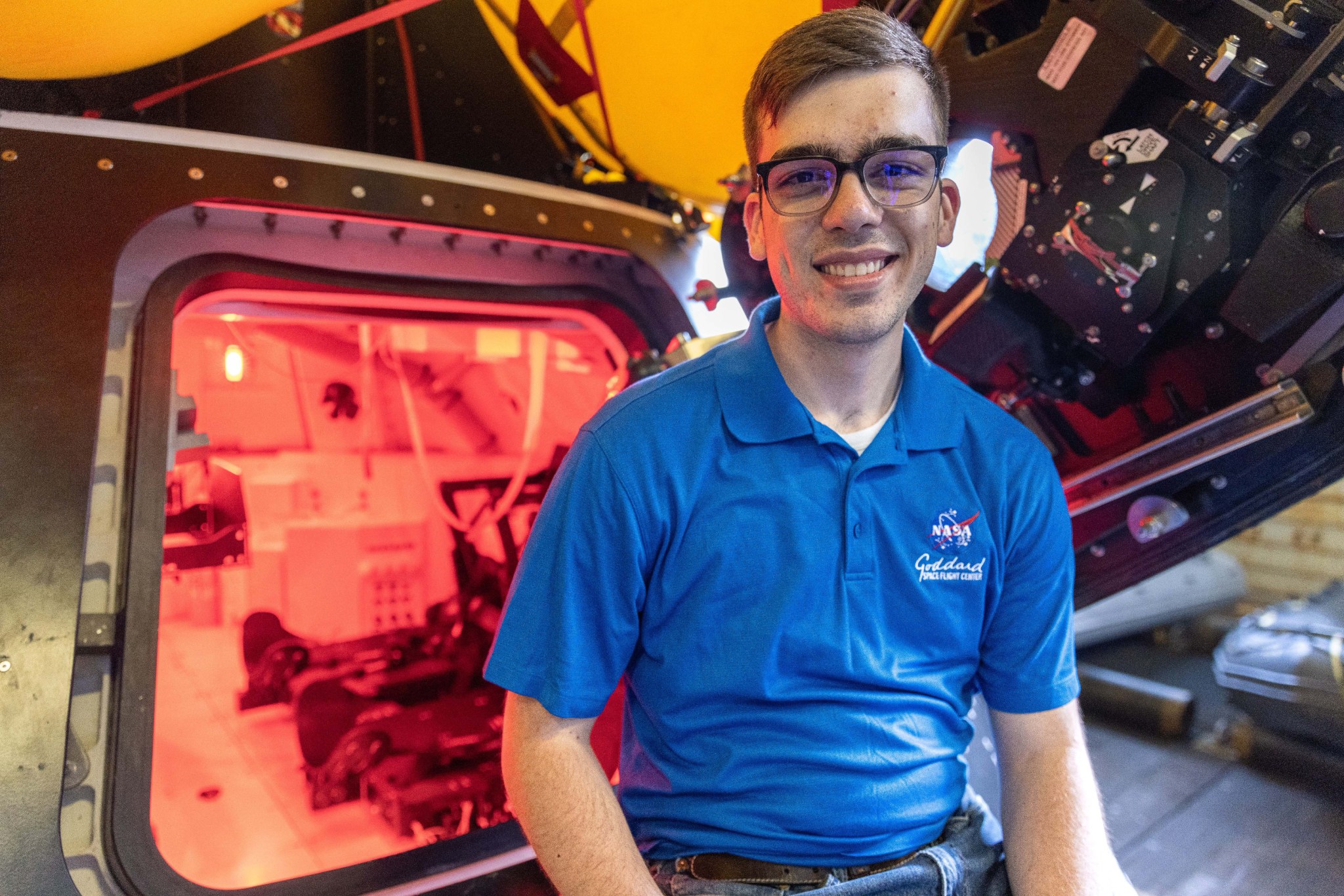 Thomas Montano during Artemis II Underway Recovery Test 10 in front of the Orion Test Capsule.