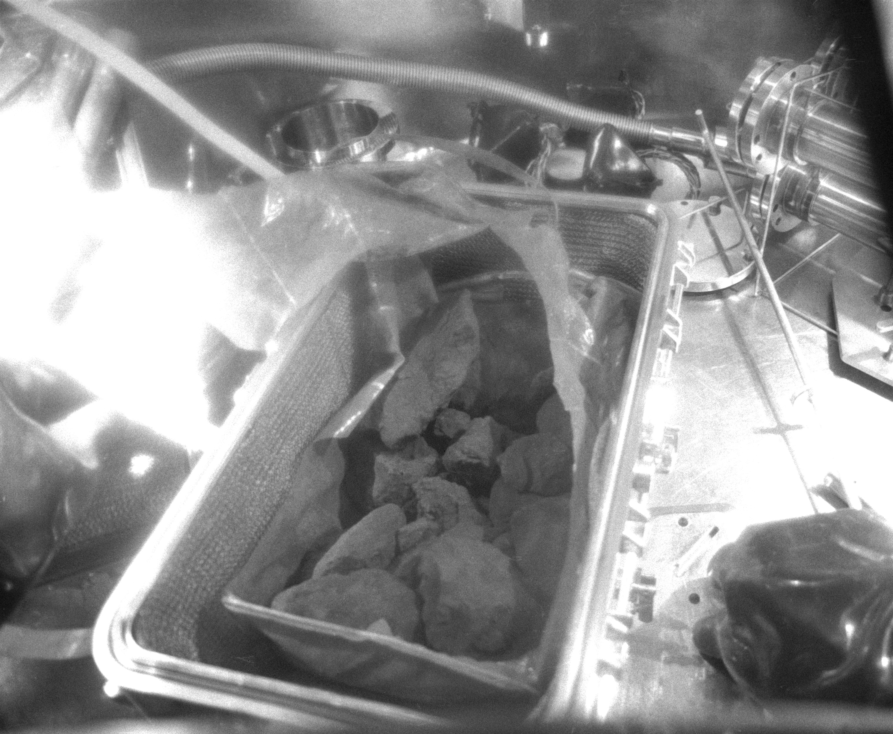 The box has been opened, revealing the first lunar samples