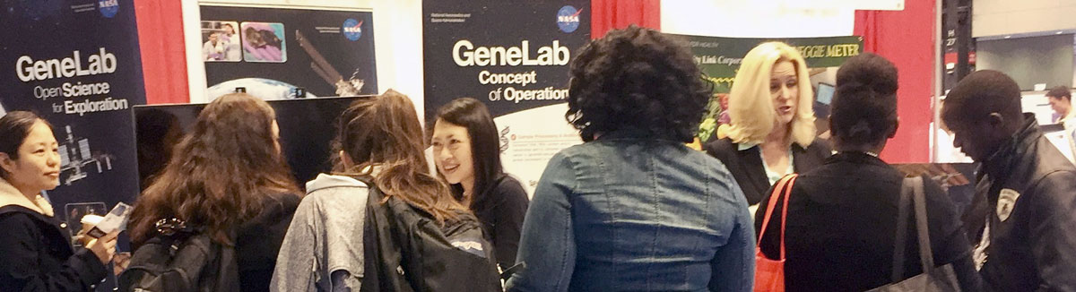 Image showing GeneLab members at the exhibit booth at the Experimental Biology Conference.