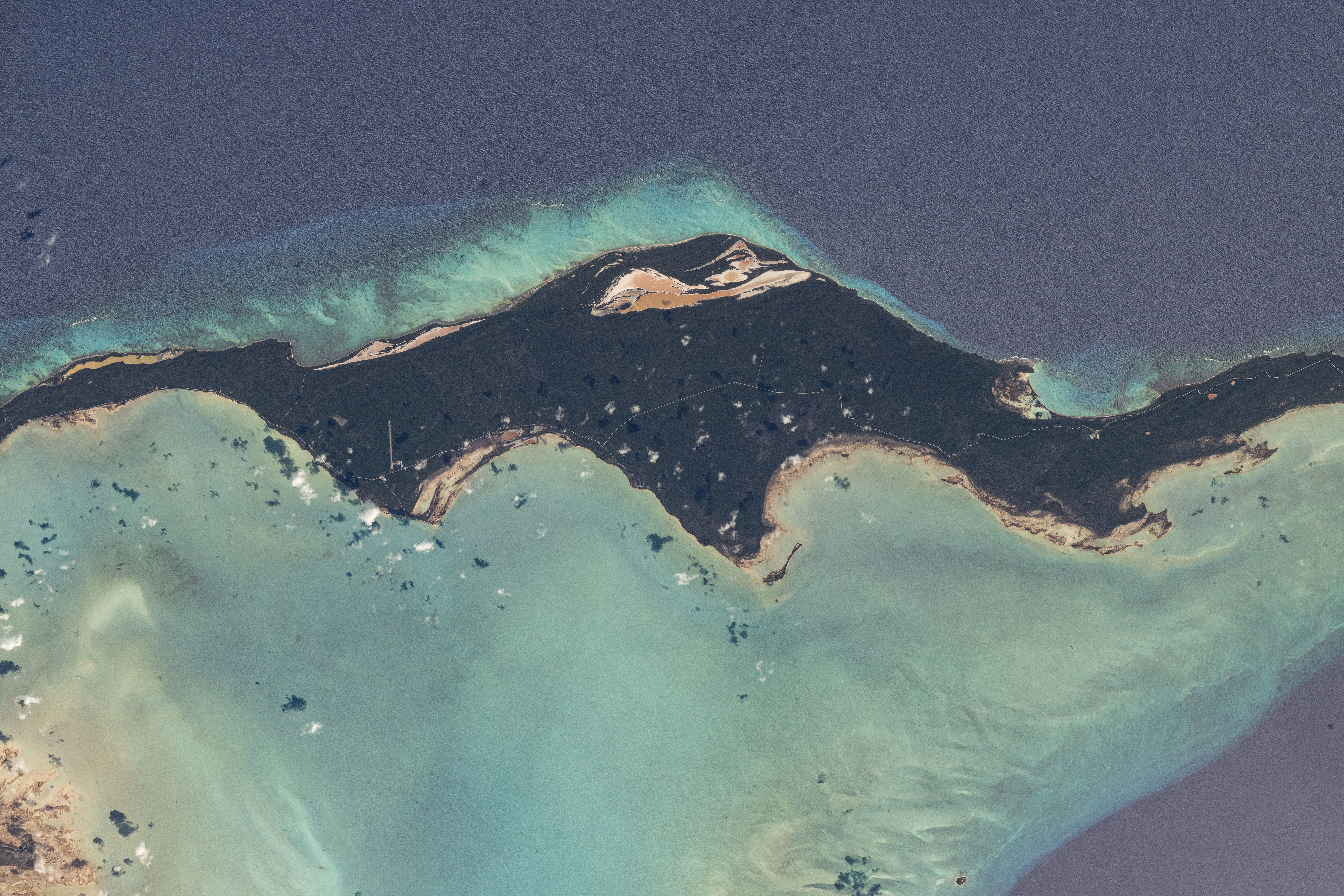 iss071e365062 (July 18, 2024) -- Acklins, an island in The Bahamas, was photographed by NASA astronaut Mike Barratt as the International Space Station orbited 256 miles above.