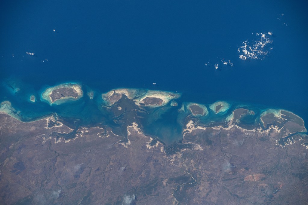 iss071e378497 (July 21, 2024) -- The Quirimbas Islands lie in the western Indian Ocean off the coast of Mozambique. The archipelago consists of 32 islands, partially linked to the coastline by coral reefs, mangroves, and sand bars. As the International Space Station orbited 262 miles above, NASA astronaut Matthew Dominick captured this photo.