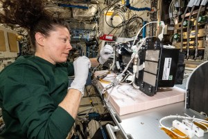 NASA astronaut and Expedition 71 Flight Engineer Tracy C. Dyson services research components inside the Solid Combustion Experiment Module (SCEM) aboard in the Interational Space Station's Kibo laboratory module. The SCEM enables combustion research in microgravity to study how materials burn in weightlessness and improve fire safety techniques aboard spacecraft.