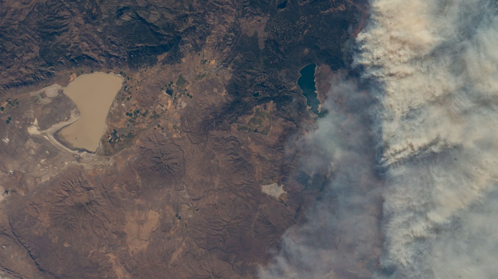 Wildfires just northwest of California's Eagle Lake and Honey Lake (far left) are pictured from the International Space Station as it orbited 260 miles above The Golden State.