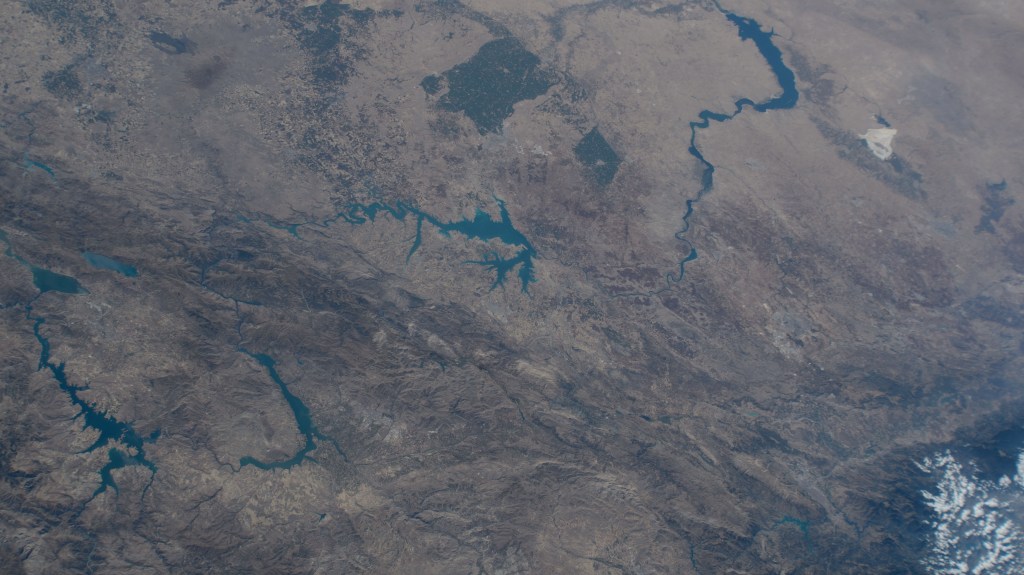Lake Assad in Syria (upper right) and lakes created by hydroelectric dams in Turkiye, all along the Euphrates River, are pictured from the International Space Station as it orbited 263 miles above the Turkish nation that connects Europe with Asia.