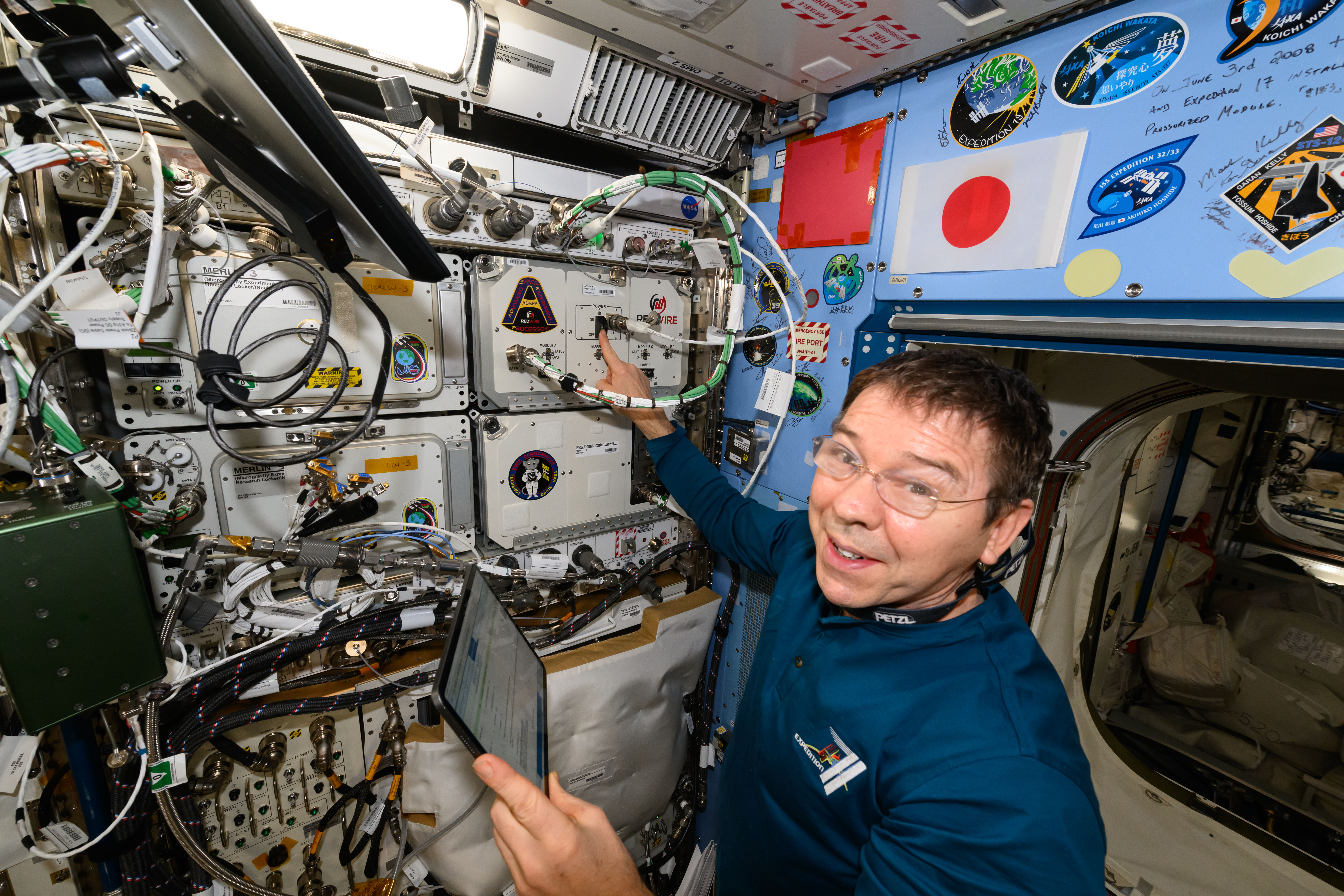 NASA astronaut and Expedition 71 Flight Engineer Mike Barratt installs a new sample processor, also known as the Advanced Space Experiment Processor (ADSEP), inside the International Space Station's Kibo laboratory module. ADSEP can be packed with research samples and launched to space or returned to Earth aboard a Northrop Grumman Cygnus space freighter or a SpaceX Dragon cargo craft. ADSEP supports cell and tissue culturing, protein crystal growth, microorganism and bacteria studies, and materials science research.