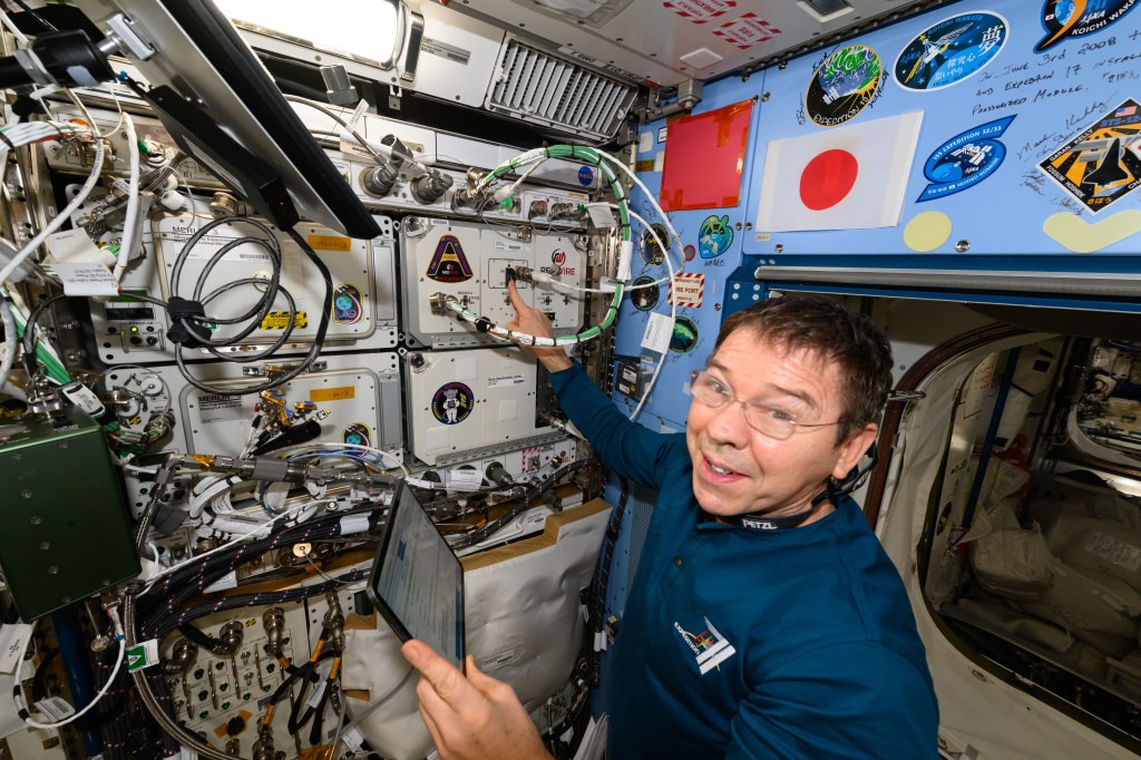 NASA astronaut and Expedition 71 Flight Engineer Mike Barratt installs a new sample processor, also known as the Advanced Space Experiment Processor (ADSEP), inside the International Space Station's Kibo laboratory module. ADSEP can be packed with research samples and launched to space or returned to Earth aboard a Northrop Grumman Cygnus space freighter or a SpaceX Dragon cargo craft. ADSEP supports cell and tissue culturing, protein crystal growth, microorganism and bacteria studies, and materials science research.