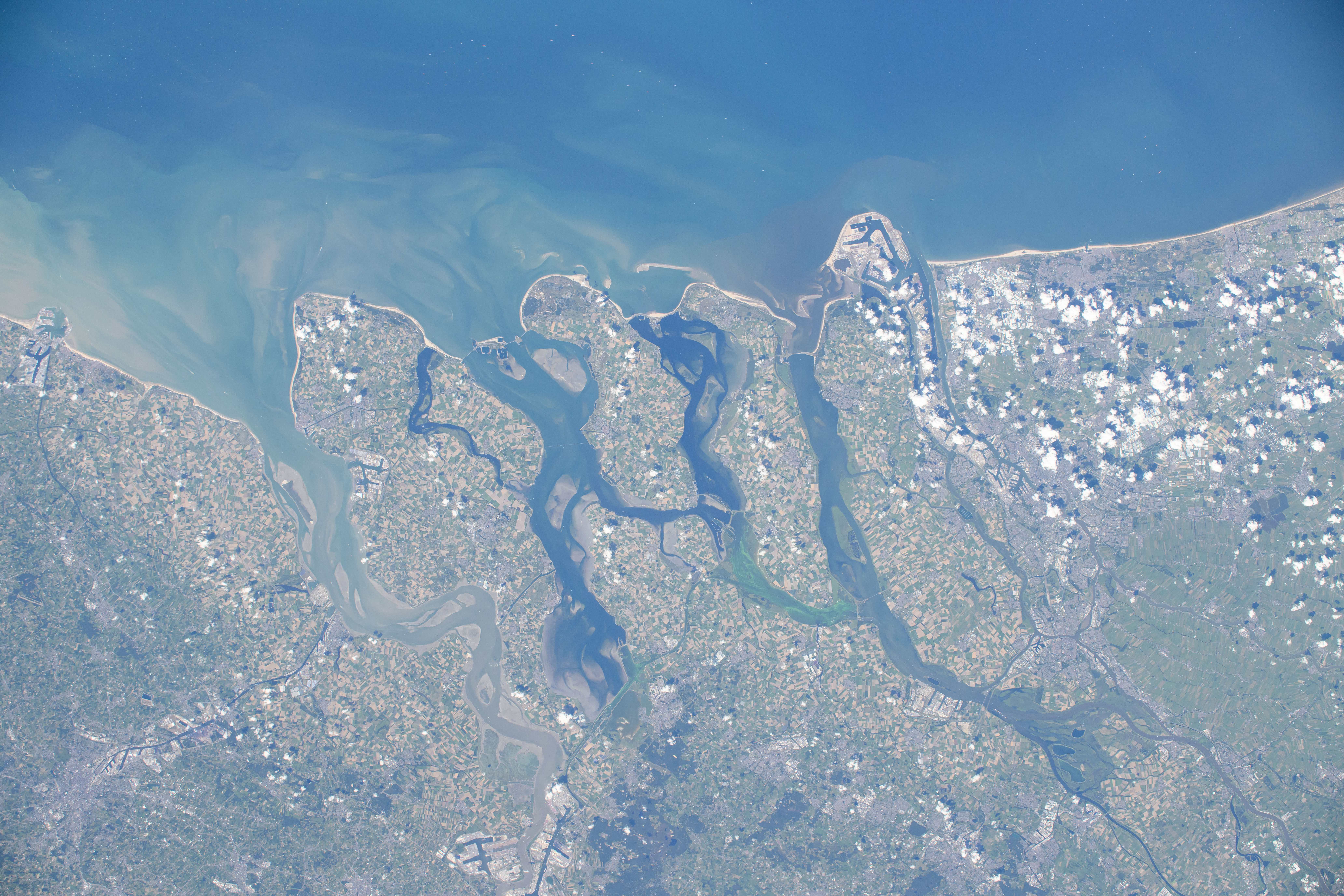 The Hague and Rotterdam, cities next to the Rhine–Meuse–Scheldt river delta in Netherlands on the coast of the North Sea, are pictured from the International Space Station as it orbited 263 miles above Northern Europe.