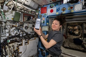 NASA astronaut and Expedition 71 Flight Engineer Tracy C. Dyson displays a sample processor for the Pharmaceutical In-space Laboratory experiment that is exploring the production and manufacturing of medicines to benefit astronauts in space and humans on Earth. She installed the processor in the Advanced Space Experiment Processor, or ADSEP, that can house a variety of research samples and be delivered to the International Space Station and returned to Earth aboard the SpaceX Dragon cargo craft.