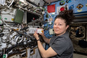 NASA astronaut and Expedition 71 Flight Engineer Tracy C. Dyson swaps a hard drive inside the Advanced Space Experiment Processor-4, or ADSEP-4. The research device enables the automated processing of samples in microgravity, is configurable for space biology and space physics investigations, and can be launched to the International Space Station and returned to Earth inside the SpaceX Dragon cargo spacecraft for further processing and analysis.