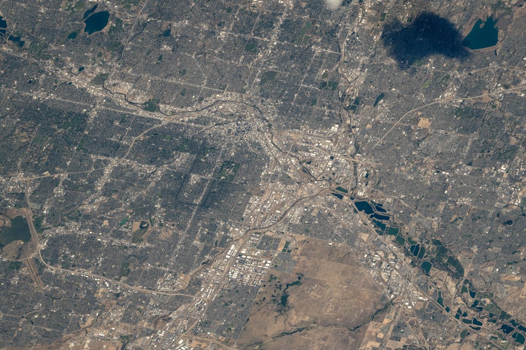 Denver, Colorado, the Centennial State's capital city with a population of over 715,000, and its suburbs along the South Platte River are pictured from the International Space Station as it orbited 260 miles above.