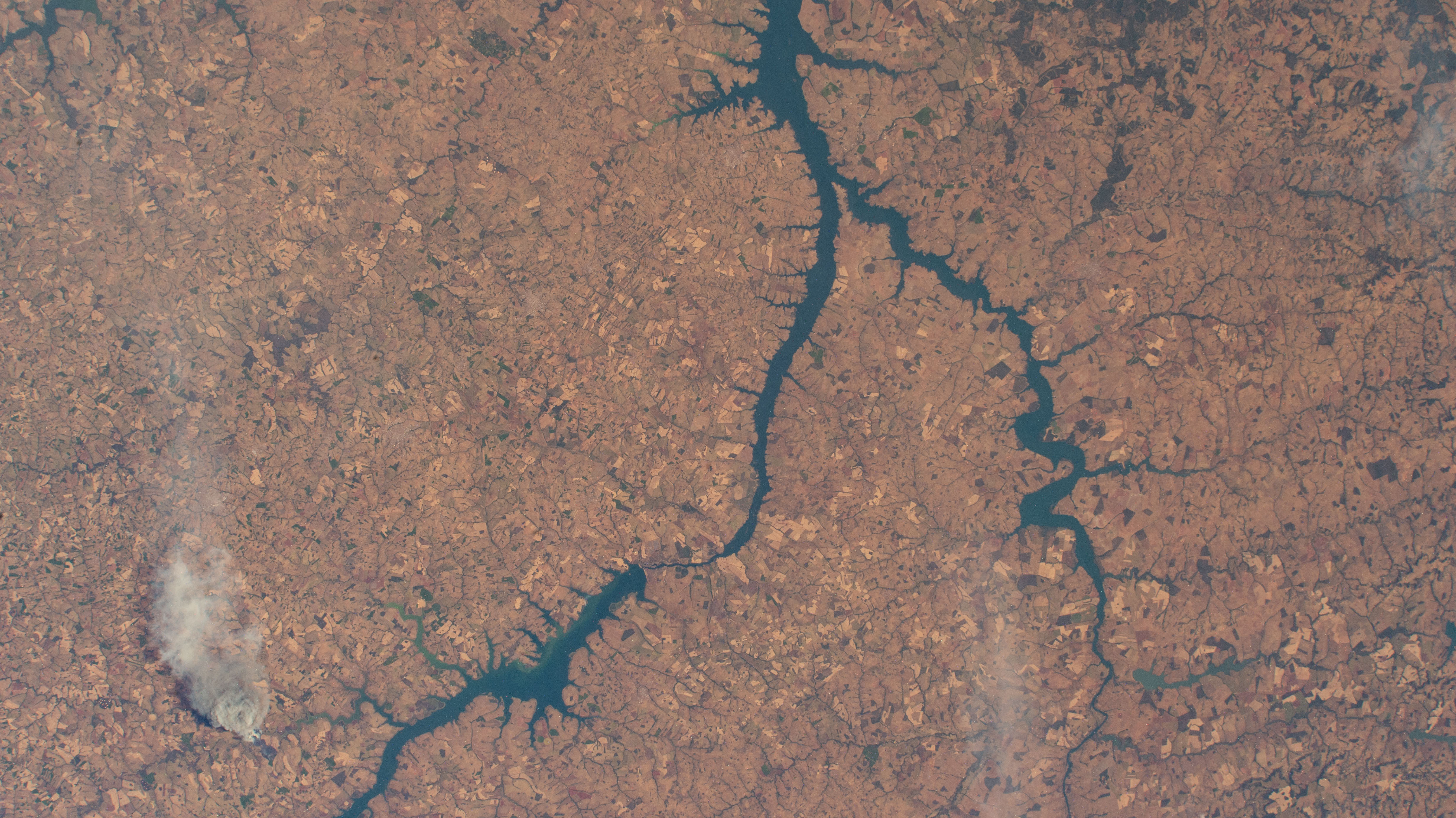 Brazil's Single Island Dam (top) leads into the Paranaiba River which splits into the Rio Grande that leads into the Red Water Dam. The International Space Station was orbiting 260 miles above the South American nation at the time of this photograph.