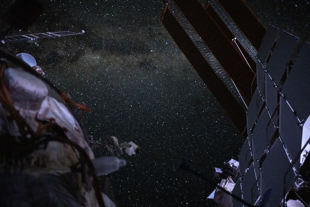 The Milky Way is pictured from the International Space Station near the top of this long-duration photograph with a camera programmed for high sensitivity.