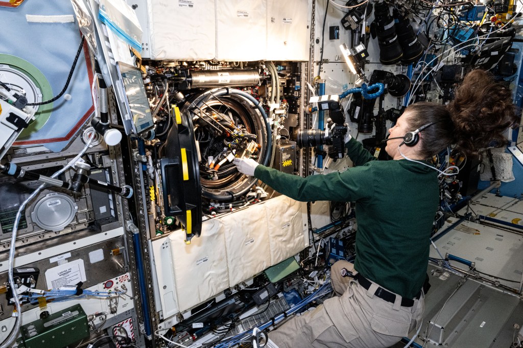 NASA astronaut and Expedition 71 Flight Engineer Tracy C. Dyson replaces experiment hardware in the Combustion Integrated Rack located aboard the International Space Station's Destiny laboratory module. The hardware replacement work was for the SoFIE-MIST investigation that is exploring ways to design safer materials for future space facilities and determine the best methods for extinguishing fires in space.