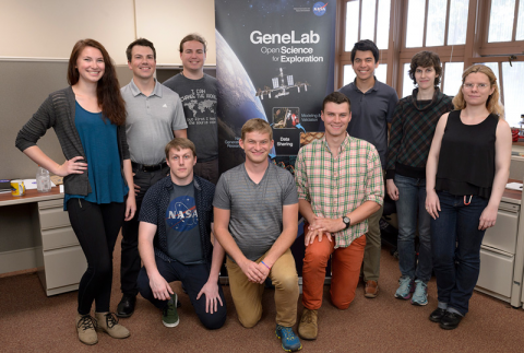 group of interns together smiling at the camera