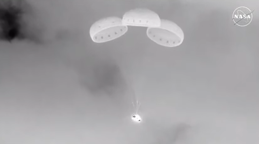 Boeingâs Starliner spacecraft descends under parachutes toward its landing site in New Mexico during its return to Earth on Friday, Sept. 6, 2024.