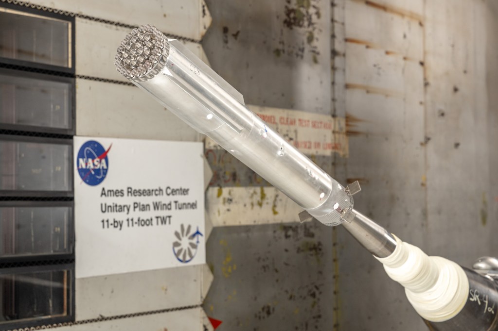 A 1.2% scale model of the Super Heavy rocket that will launch the Starship human landing system to the Moon for future crewed Artemis missions was recently tested at NASA's Ames Research Center's transonic wind tunnel, providing valuable information on vehicle stability when re-entering Earth's atmosphere.