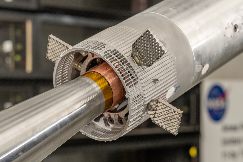 Four grid fins on the Super Heavy rocket help stabilize and control the rocket as it re-enters Earth's atmosphere after launching Starship to a lunar trajectory. Engineers tested the effects of various aerodynamic conditions on several grid fin configurations during wind tunnel testing.