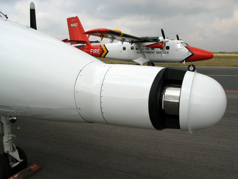 CAR mounted on nose of J-31. It looks to be cylinder shaped with a head at the end while a red plane is in the background