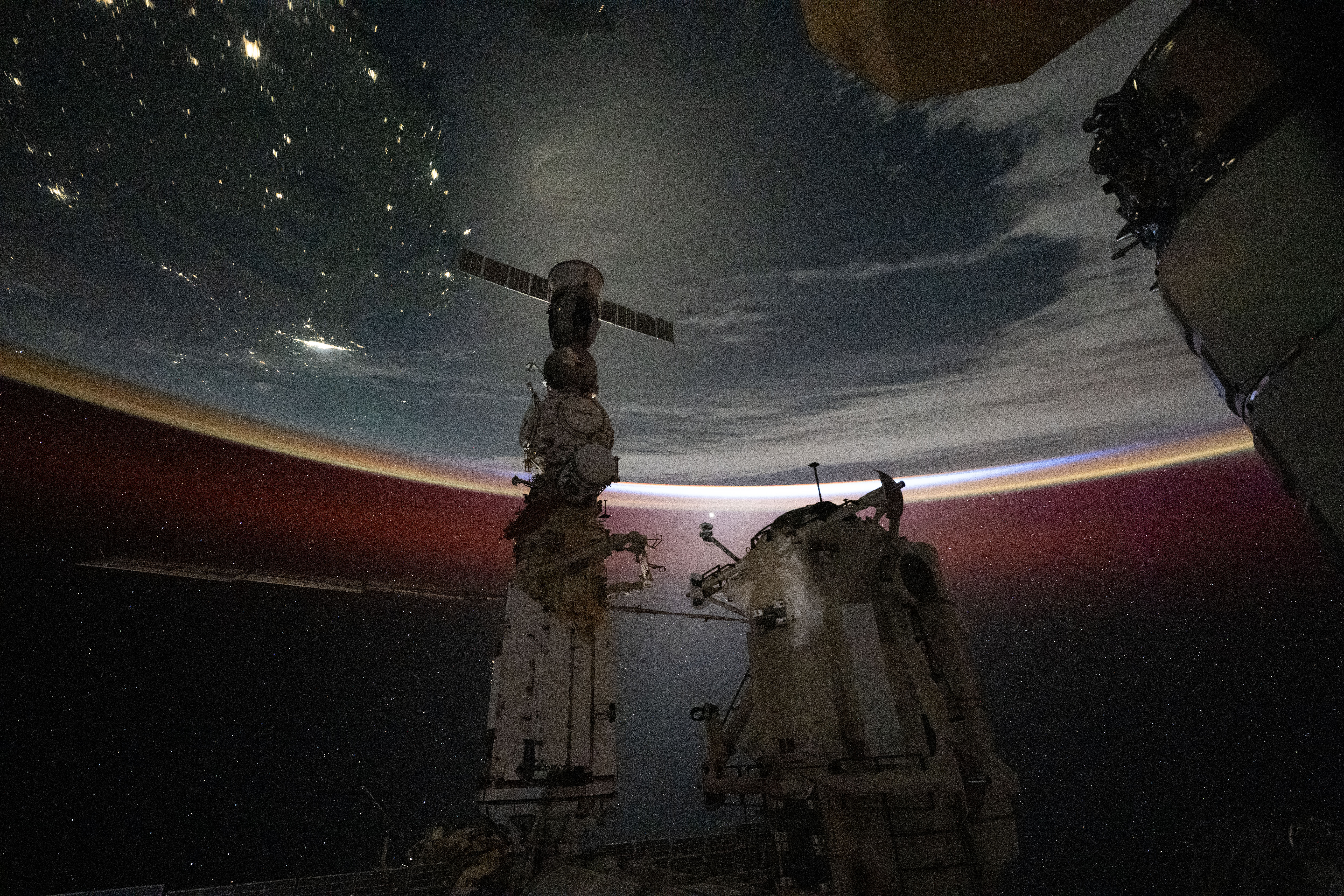 The last rays of an orbital sunset illuminate Earth's atmosphere in this photograph from the International Space Station as it orbited 267 miles above the Tasman Sea off the coast of southeastern Australia.