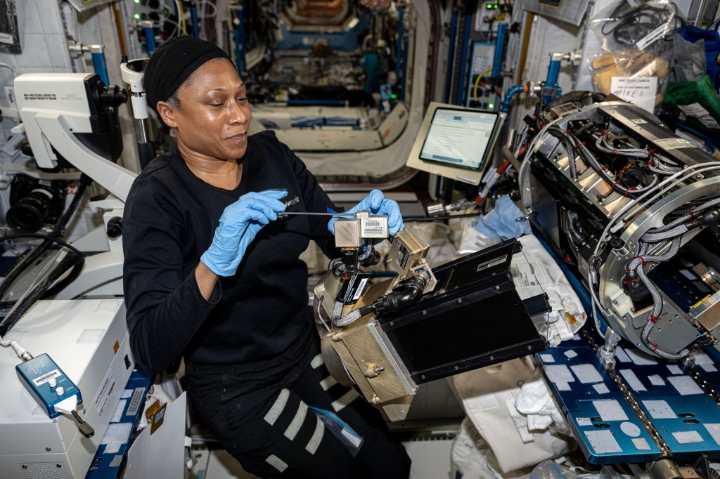 NASA astronaut and Expedition 71 Flight Engineer Jeanette Epps replaces and cleans research components inside the Destiny laboratory module's Combustion Integrated Rack for a series of fire safety investigations. The experiments explore how flames spread, how materials burn, and ways to extinguish fires in microgravity to improve safety in space.