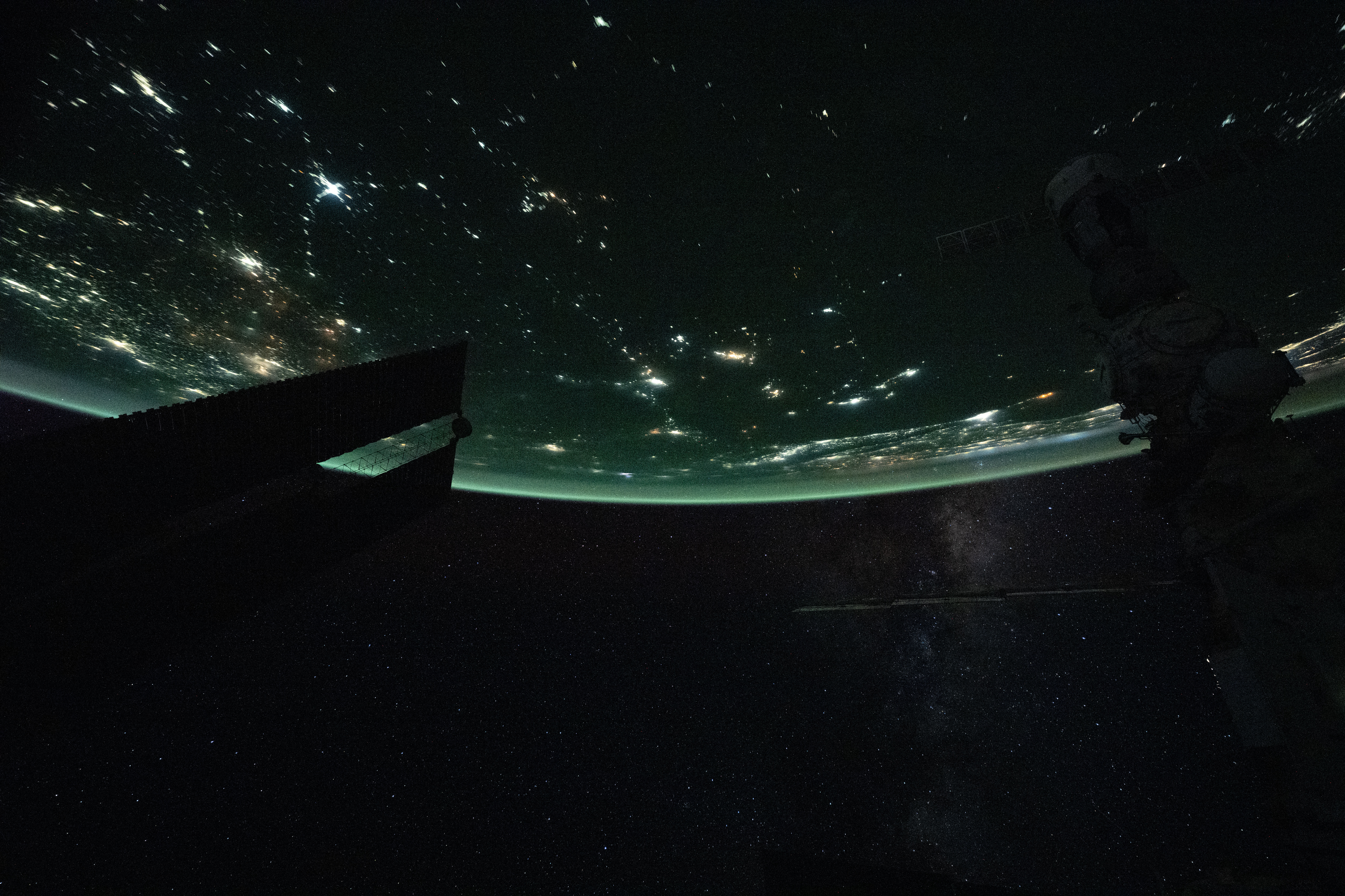 NASA astronaut and Expedition 71 Flight Engineer Matthew Dominick programmed a camera for high sensitivity and pointed it out an International Space Station window as it orbited 266 miles above Kazakhstan. At lower right, a wispy Milky Way is pictured amongst a starry night sky.