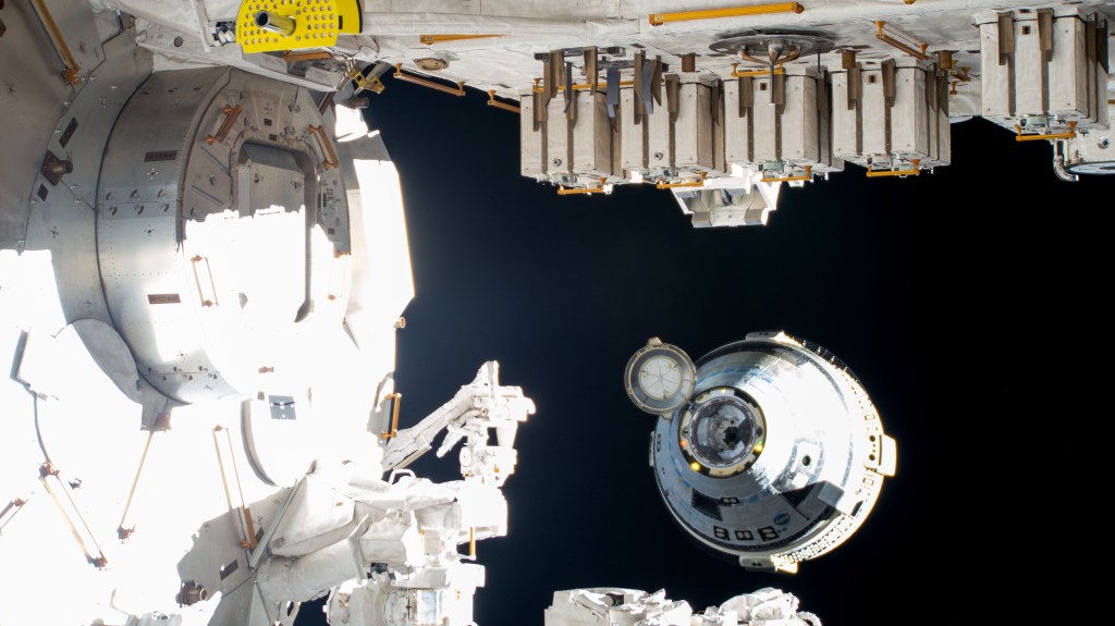 Boeing's uncrewed Starliner spaceraft backs away from the International Space Station moments after undocking from the Harmony module's forward port. Starliner would safely parachute to a landing at White Sands Space Harbor in New Mexico less then six hours later.