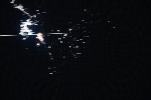 Boeing's uncrewed Starliner spacecraft is pictured from the International Space Station reentering Earth's atmosphere and creating a plasma trail with its heat shield 259 miles above the Mexican state of Chihuahua. Starliner would parachute to a landing at White Sands Space Harbor in New Mexico several minutes later.