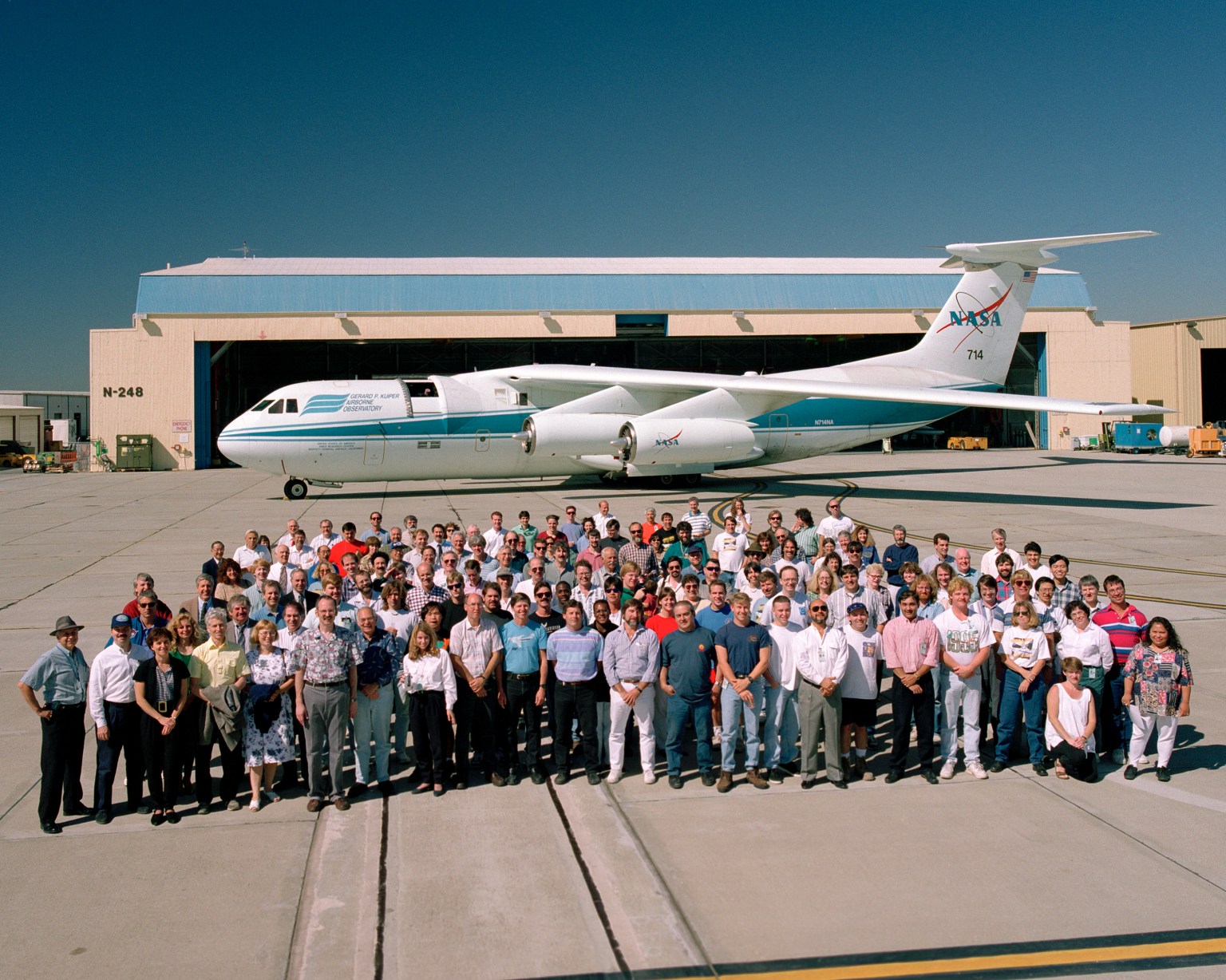 Large group of people standing around the KOA plane at NASA Ames Research Center