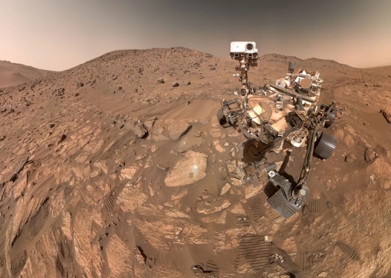 A rock nicknamed “Cheyava Falls,” which has features that may bear on the question of whether the Red Planet was long ago home to microscopic life, is to the left of the rover near the center of the image.