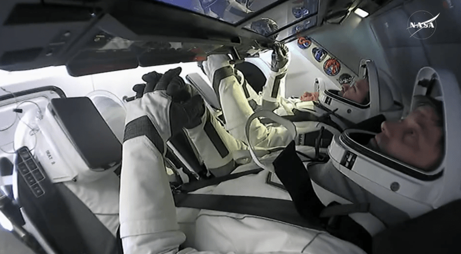 NASA astronaut Matthew Dominick is seen inside the SpaceX Dragon capsule as NASAâs SpaceX Crew-8 crew members return to Earth on Oct. 25, 2024. Dragon is scheduled to splashdown in the Gulf of Mexico off the coast of Pensacola, Florida, at 3:29 a.m. EDT.