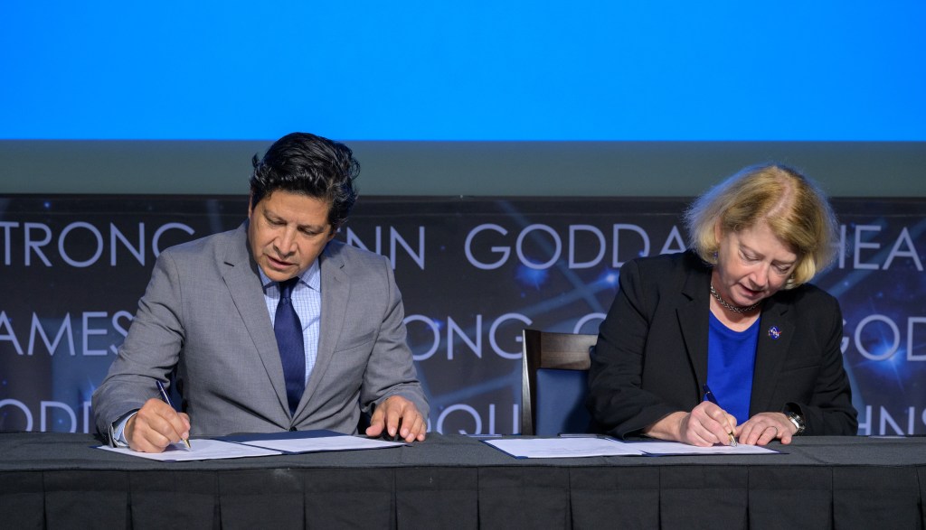President and CEO of the Hispanic Heritage Foundation Jose Antonio Tijerino, left, and NASA Deputy Administrator Pam Melroy, sign a Space Act Agreement between the HHF and NASA to collaborate and expand STEM opportunities for Latino K-12 and university students and reduce barriers to agency activities and opportunities.