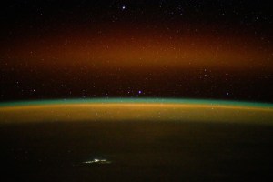 iss072e003466 (Sept. 29, 2024) -- As the International Space Station orbited 264 miles above the Northern Territory of Australia, NASA astronaut Jeanette Epps used long-exposure camera settings to capture an array of colors in Earth's horizon. A golden-green atmospheric glow crowns Earth's horizon, while stars shimmer above.