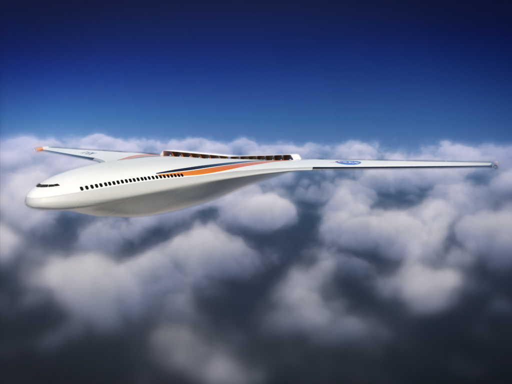 A front-view rendering of a blended wing body aircraft as it flies across a blue sky with white clouds in the background.