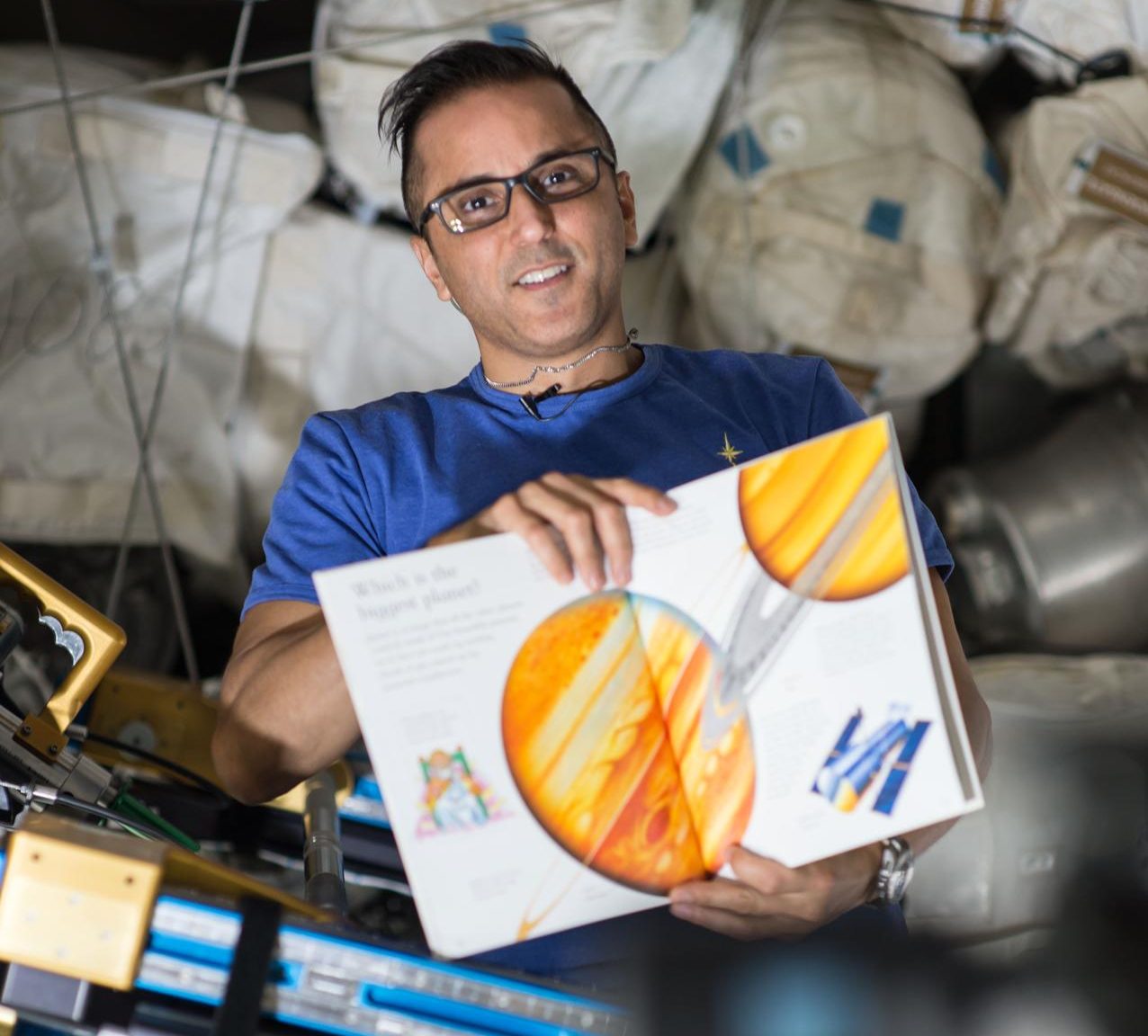 Read With NASA! Flight Engineer Joe Acaba holds a children's book that he is reading from as part of the Story Time From Space program.