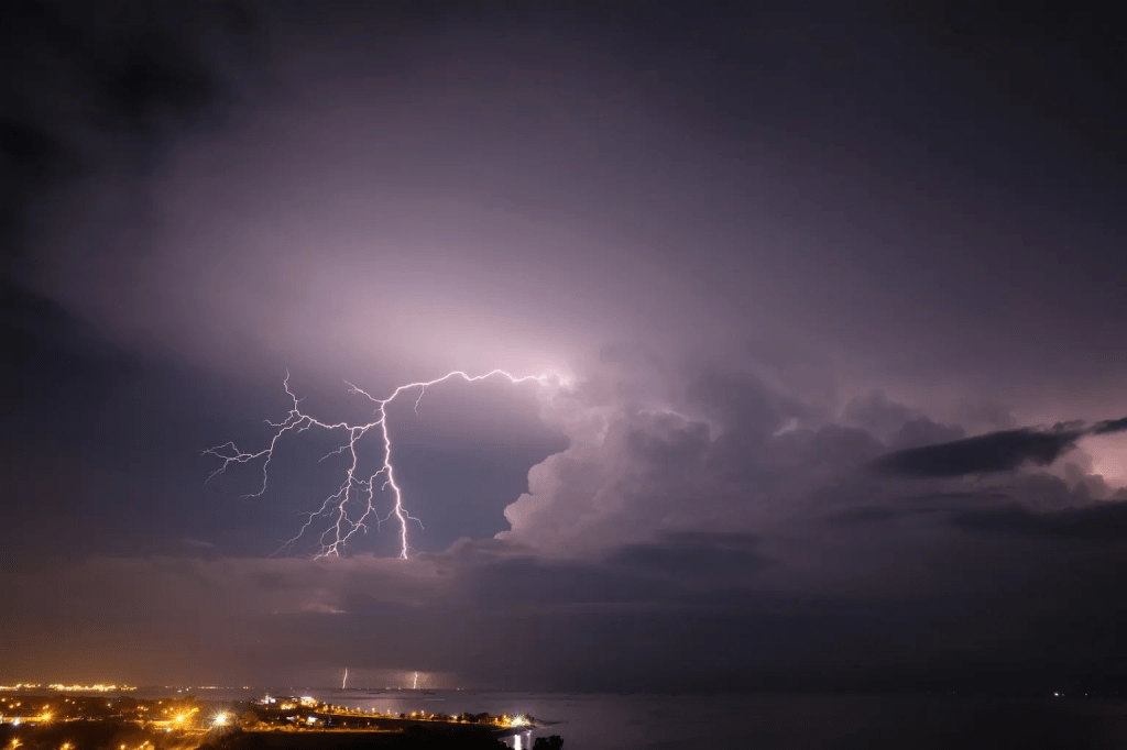 A tropical thunderstorm with lightning, near the airport of Santa Marta, Colombia.
