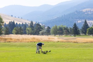 Brayden Chamberlain, UAS Pilot in Command, performs final checks on the NASA Alta X quadcopter ahead of the drone’s first flight for FireSense’s uncrewed aerial system (UAS) technology demonstration in Missoula, Montana.