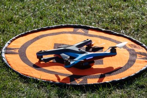 The Skydio-2 drone sits in a field just before takeoff during the FireSense uncrewed aerial system (UAS) technology demonstration in Missoula, Montana. The Skydio-2 was flown to capture images and videos of the NASA Alta X quadcopter in flight.